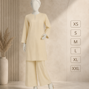 Front view of an elegant cream embroidered women's 2-piece suit featuring a long embroidered shirt with wide-leg palazzo pants displayed on a mannequin.